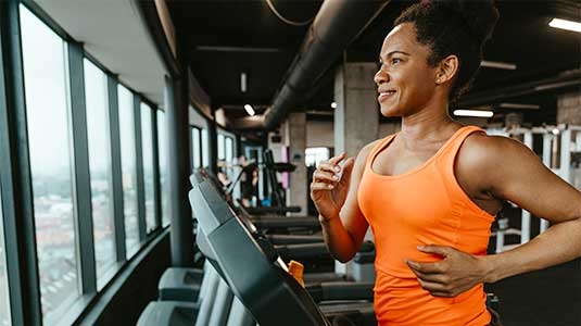 Woman running on treadmill