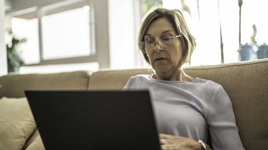 woman taking covid-19 risk assessment