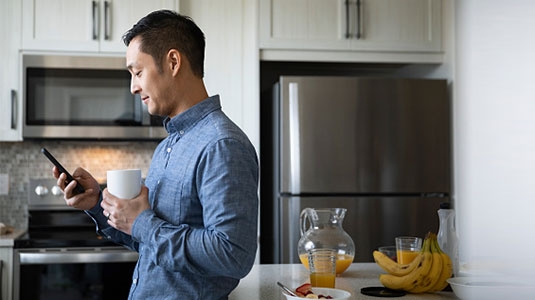 man looking at smartphone