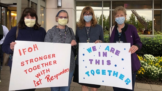 nurses outside hospital