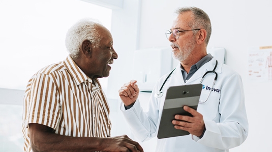 Senior patient conversation with his doctor