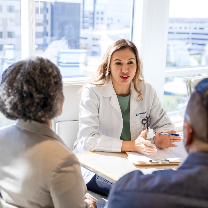 couple speaking with an interpreter 