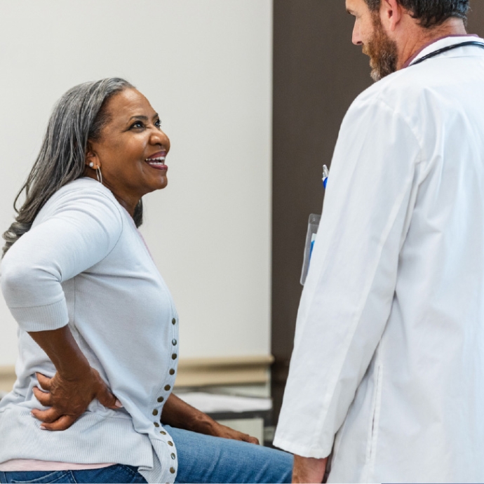 mature patient with doctor