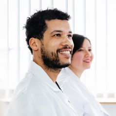 two smiling providers